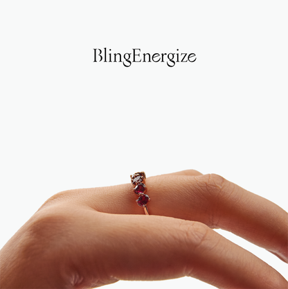 Ring with gemstones on a hand, branded 'BlingEnergize' on a white background